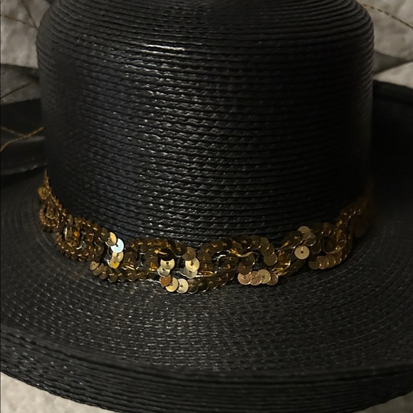 Elegant Black straw Hat with Gold Sequin Band and netting.